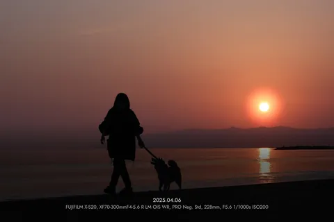 A sunset walk on the beach, no frame, caption on the photo